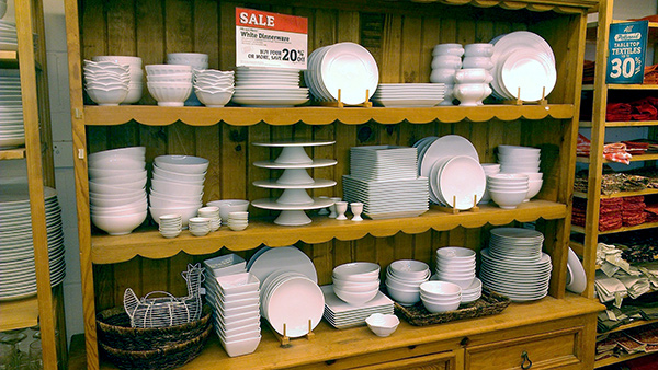 world market buying plates and bowls for product photo shoot